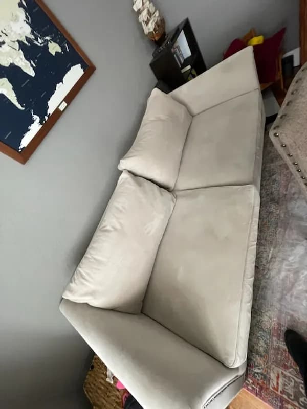 Light-colored sofa after upholstery cleaning
